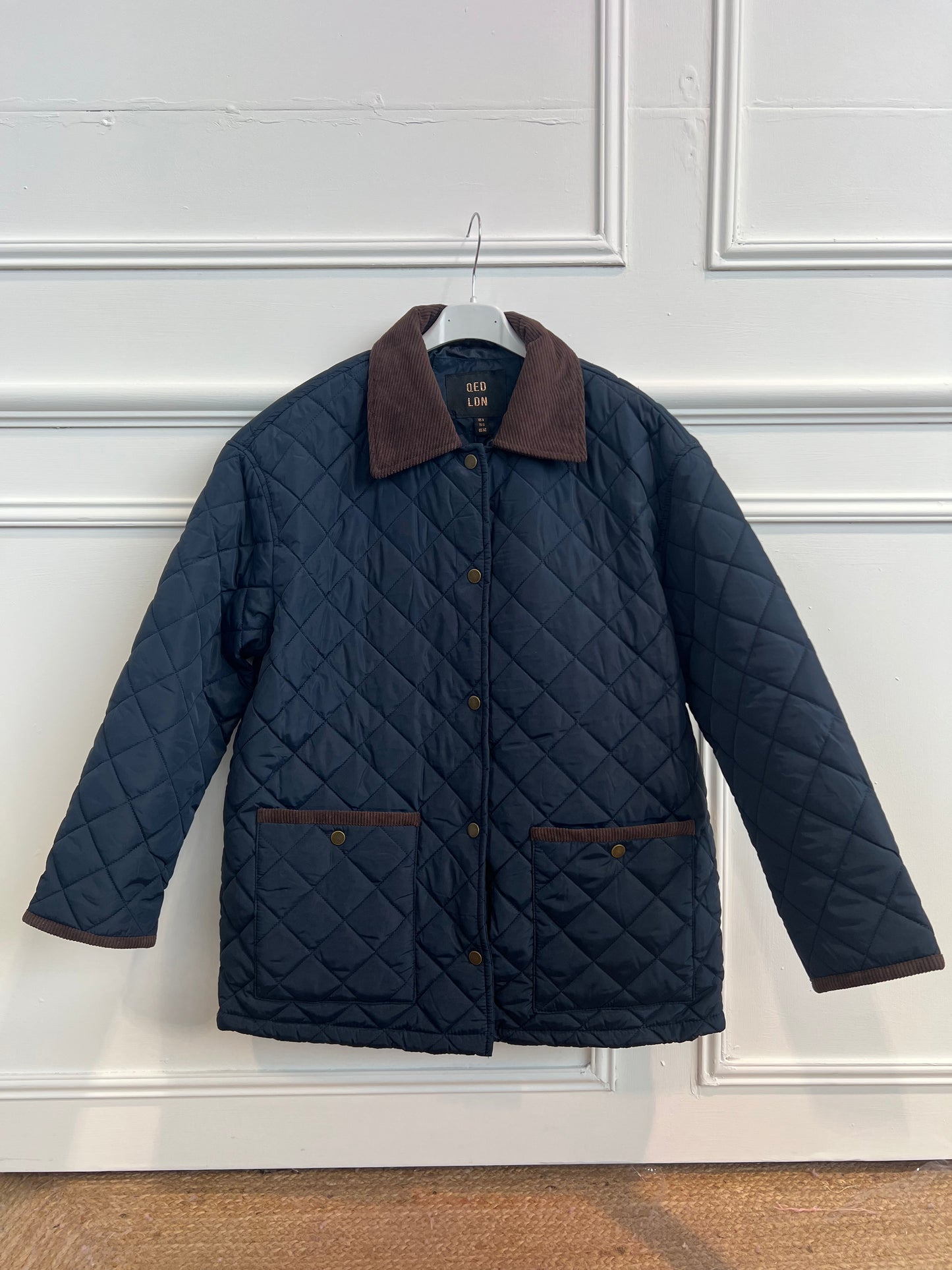 QUILTED JACKET WITH CORD COLLAR