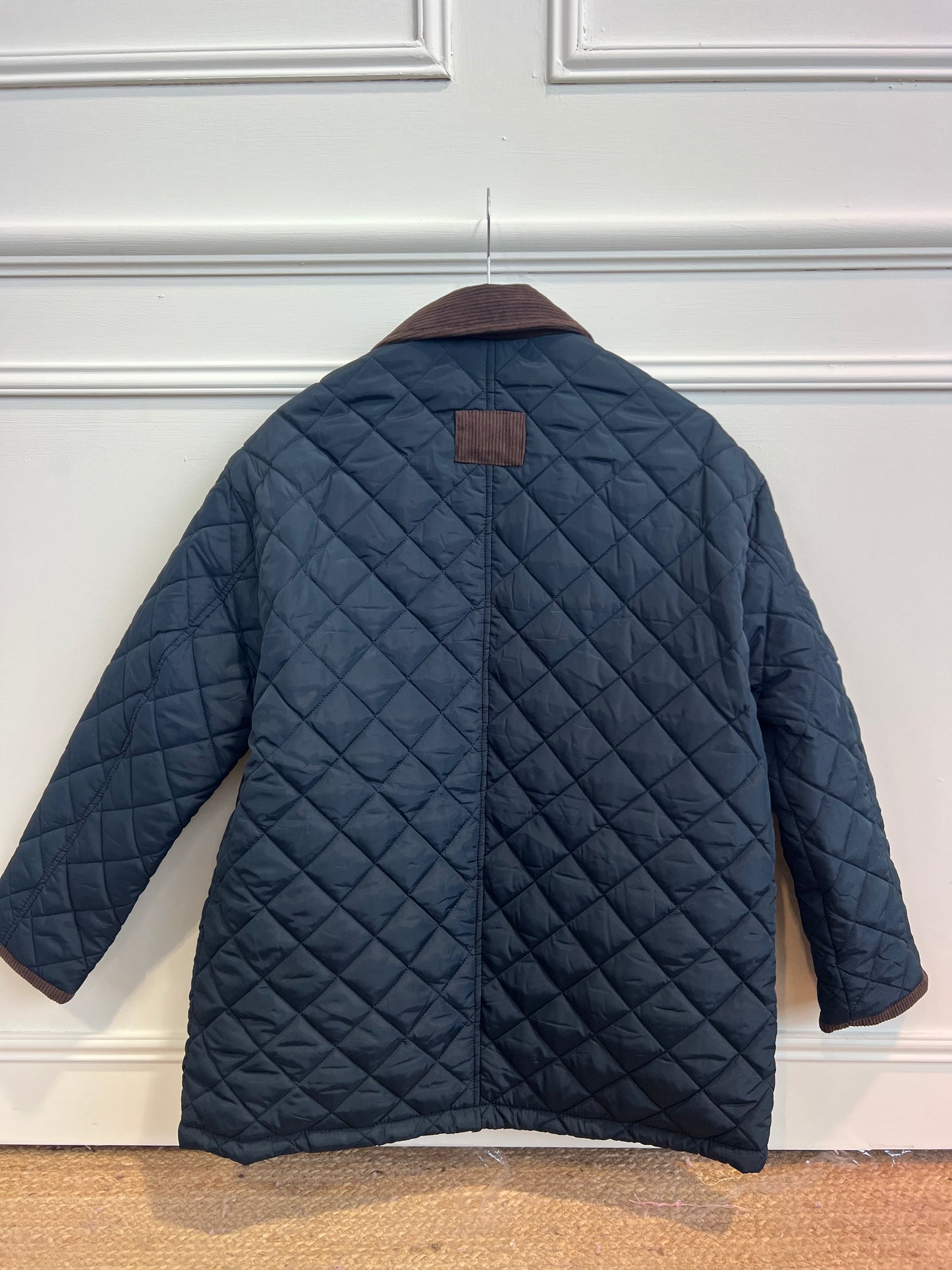 QUILTED JACKET WITH CORD COLLAR