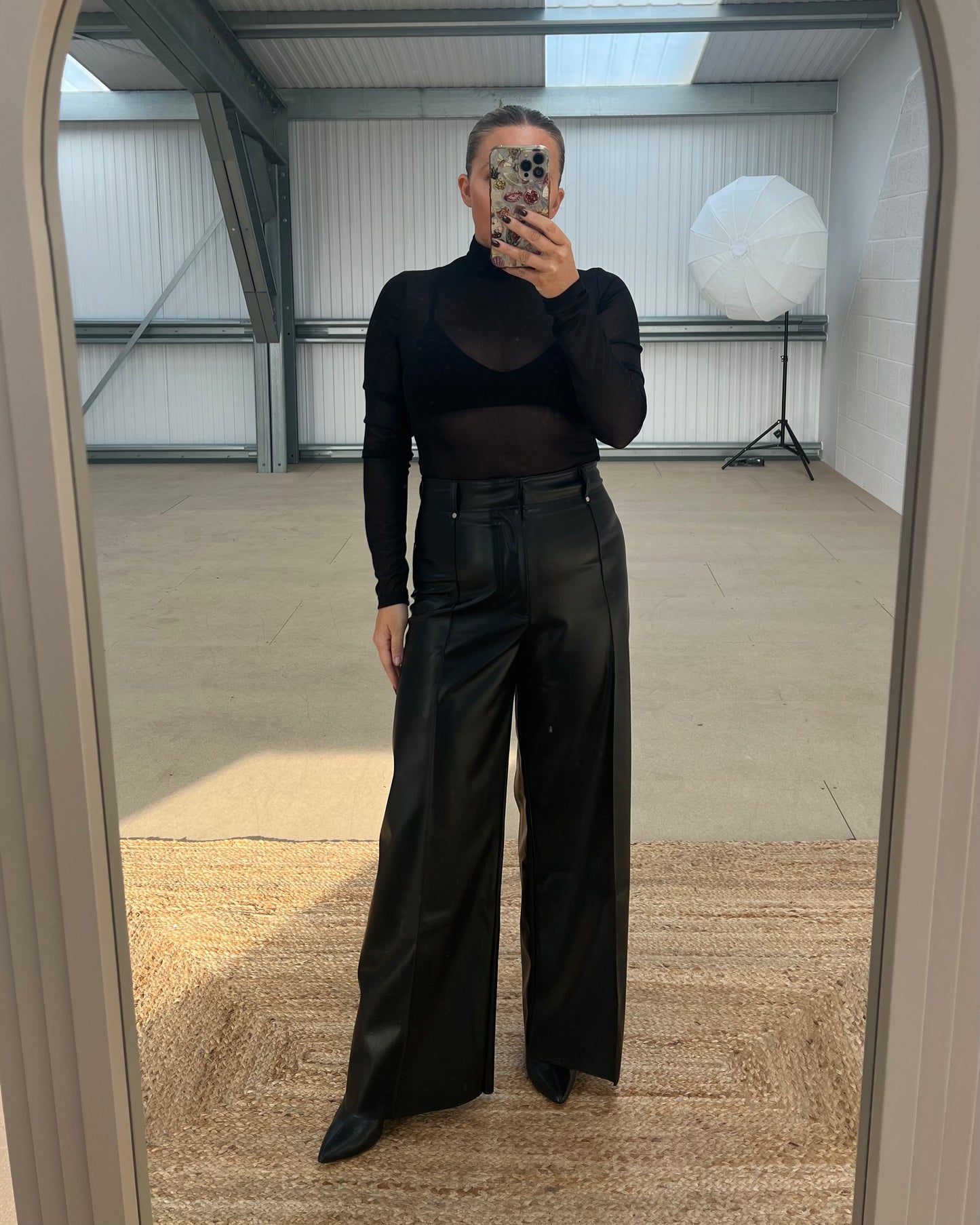 WIDE LEG FAUX LEATHER TROUSERS
