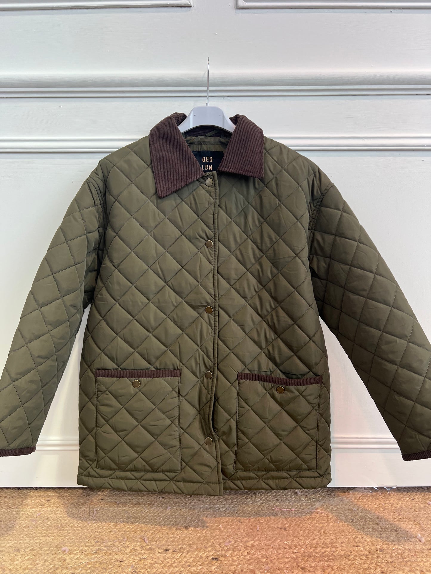 QUILTED JACKET WITH CORD COLLAR